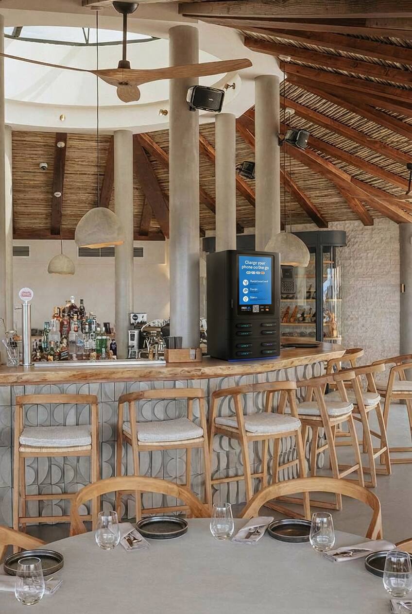 Friends on a Mallorca rooftop bar, phones staying charged
