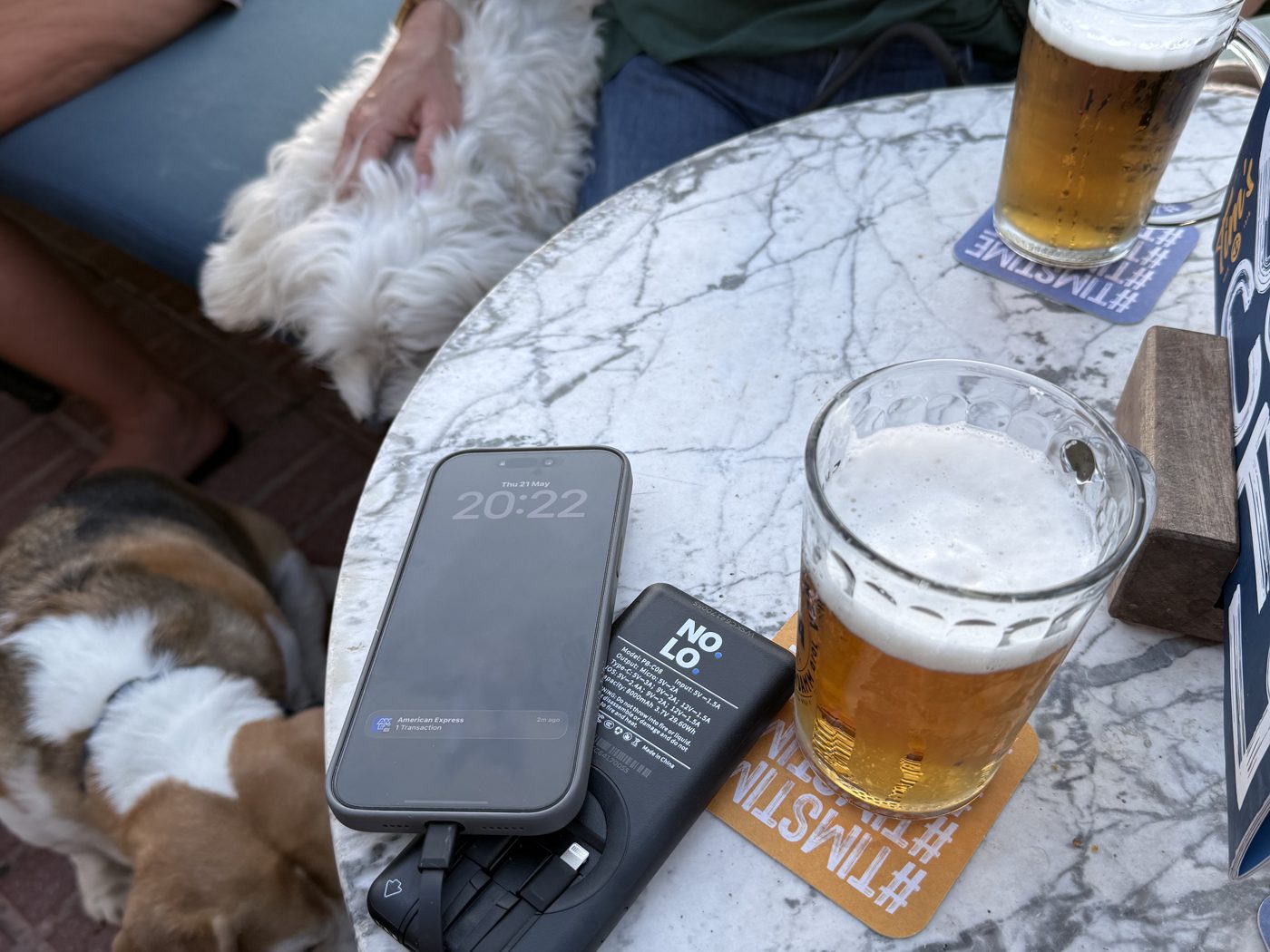 Evening at Tim's — phone charging on a NOLO powerbank