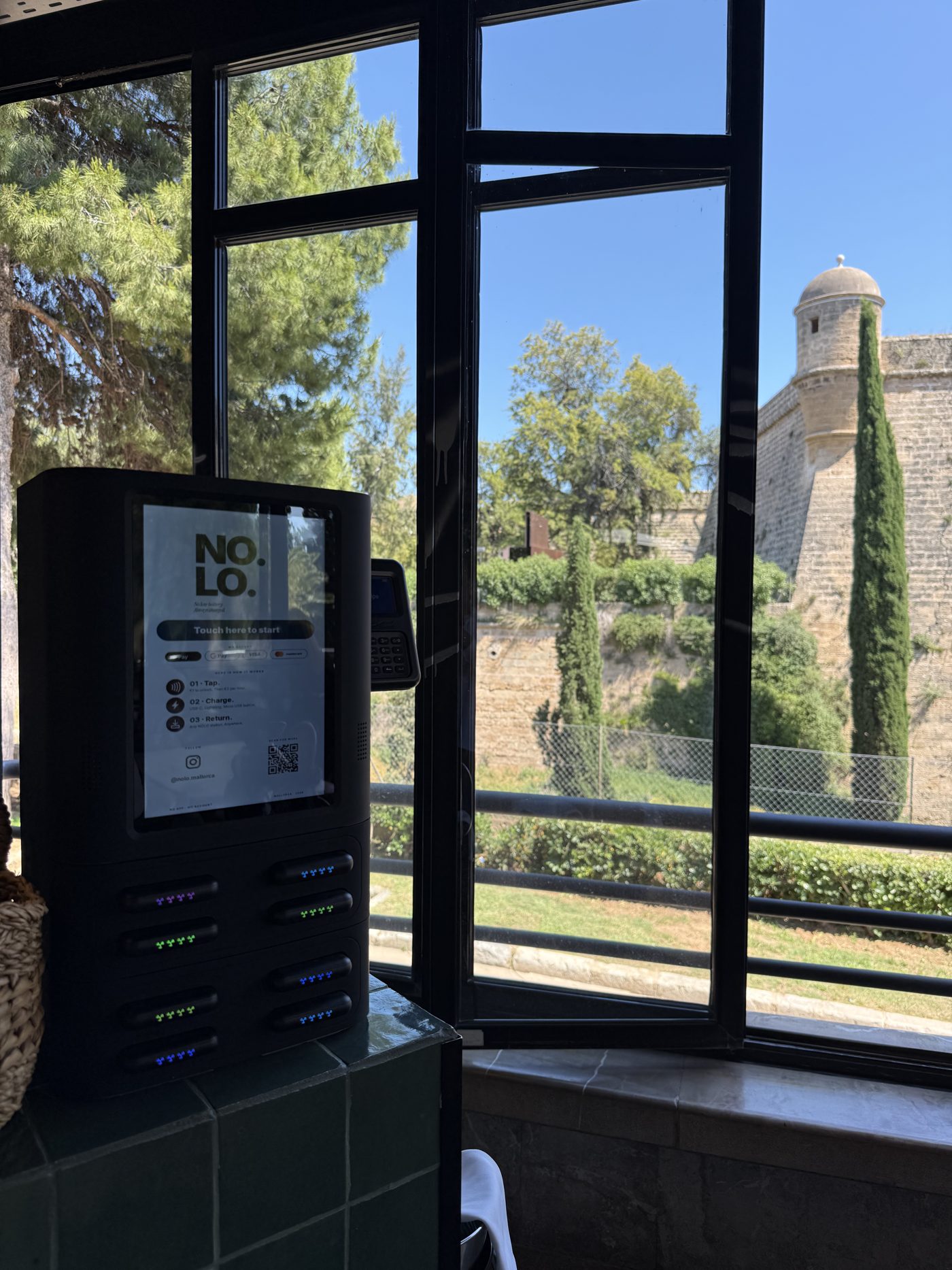 NOLO station at Caf&eacute; Poupette with Bellver castle view
